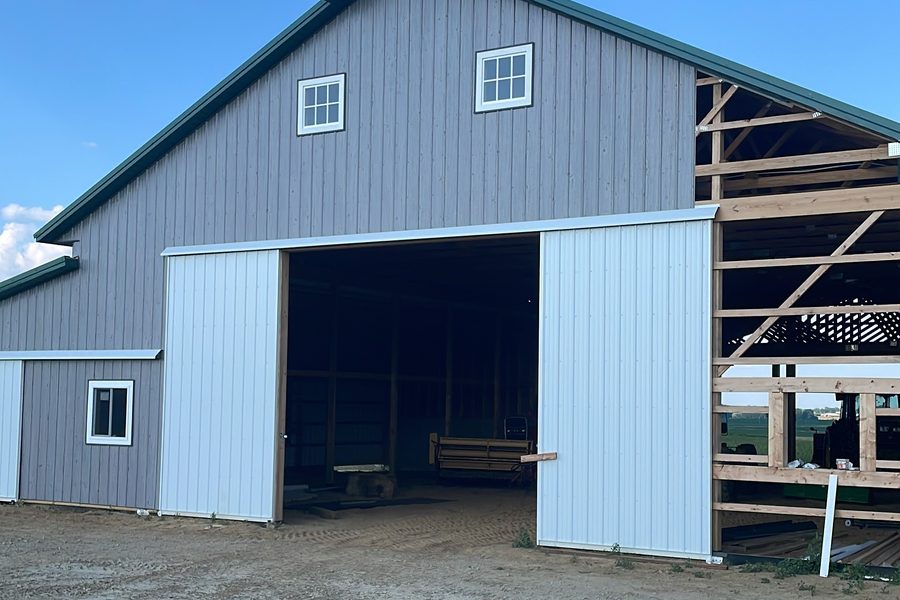 Siding — It starts looking like a barn.