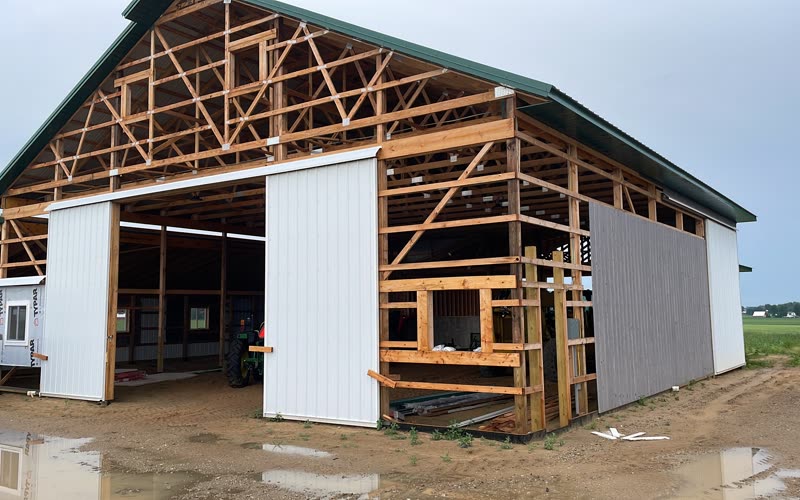 The barn frame and trusses going up